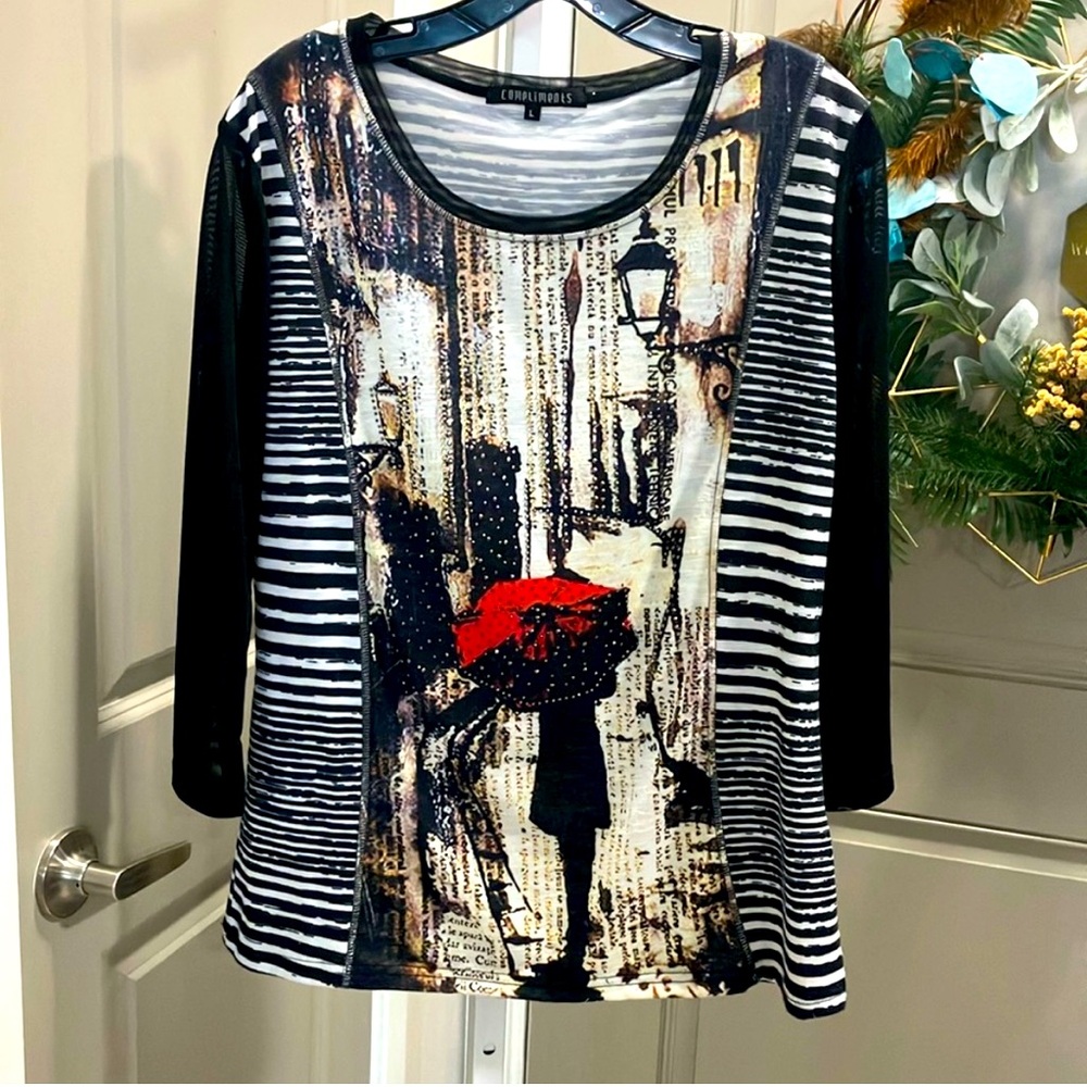 EUC: Compliments graphic, long sleeve tea size L